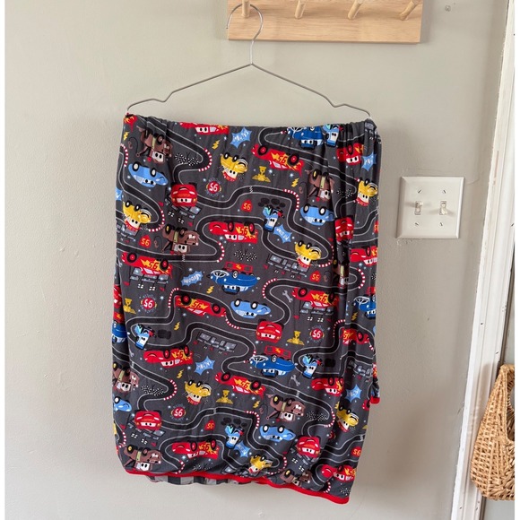 Little Sleepies Disney & Pixar Piston Cup cloud blanket